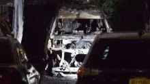 shell of a burnt out NYPD car