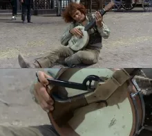 "Banjo" playing his banjo rifle, from the film "Sabata" (1969). "Banjo" playing his banjo rifle, from the film "Sabata" (1969).