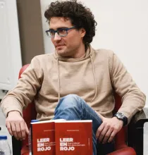 Alejandro Civantos, holding the book he wrote 'Reading in red...' Alejandro Civantos, holding the book he wrote 'Reading in red...'